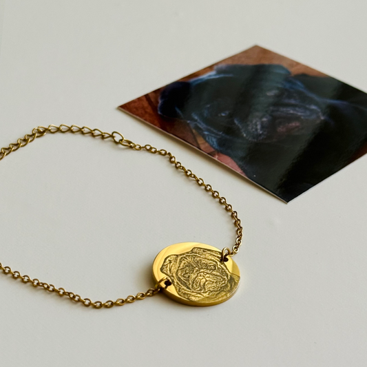 Pulsera con dije redondo